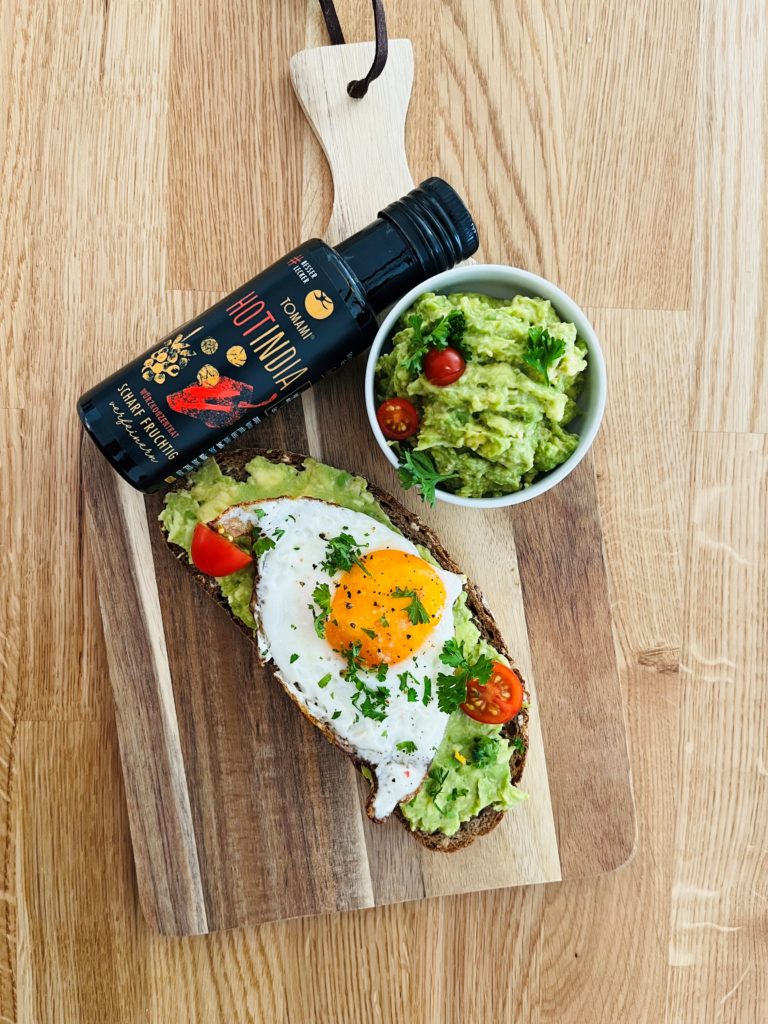 Teaser Bread with guacamole and a fried egg￼